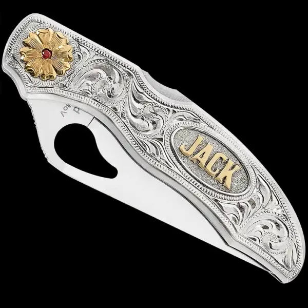 "Unleash your creativity and craft a masterpiece that’s uniquely yours!

Our Jack Custom Knife is a custom-made knife crafted using a SpyderCo Byrd knife and a German Silver plate. The plate is hand-engraved, featuring Jeweler's Bronze accents that